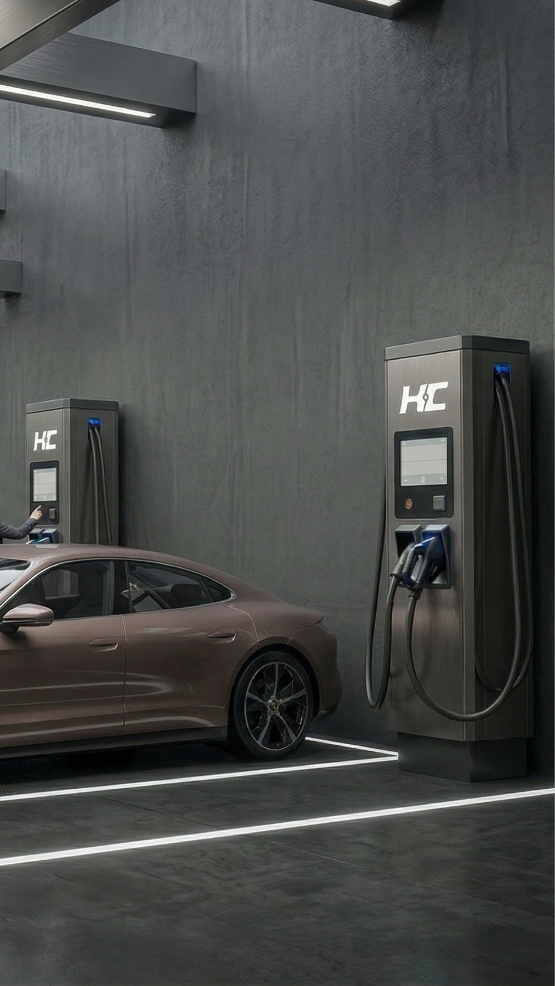 Driver using an EV charging station